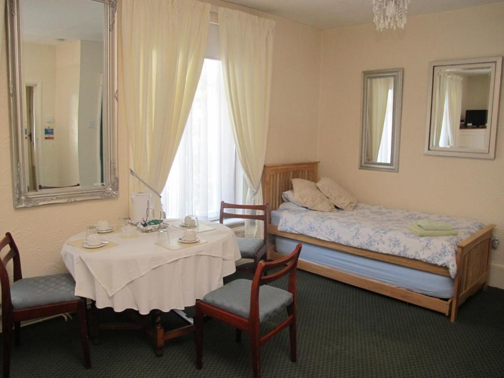 Postel nebo postele na pokoji v ubytování St Martins Guest House