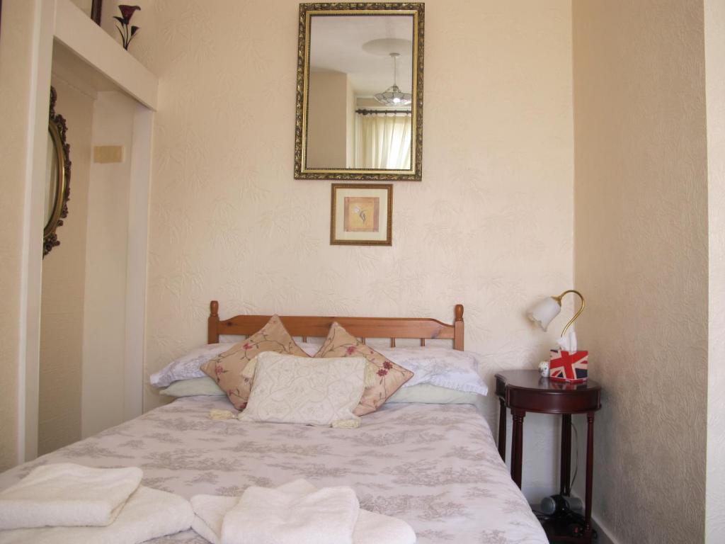 Postel nebo postele na pokoji v ubytování St Martins Guest House