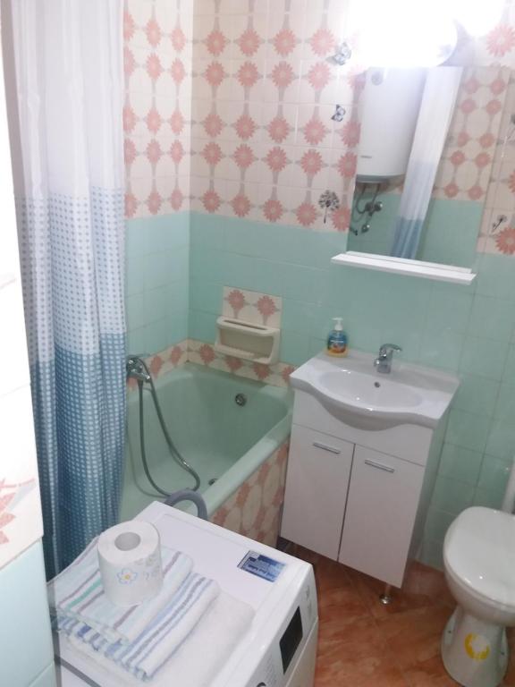Koupelna v ubytování Studio Apartment Ema