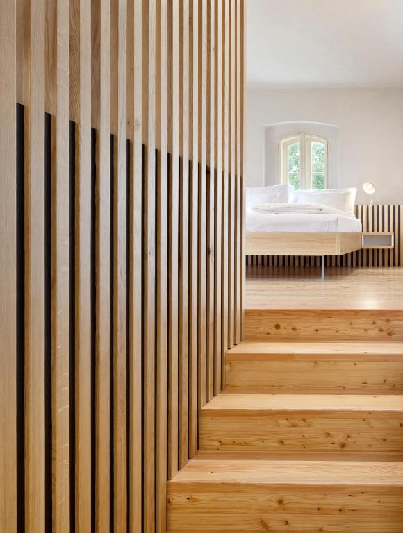 A bed or beds in a room at Hotel Kleis