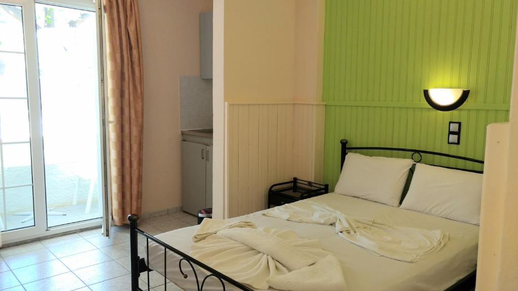 Postel nebo postele na pokoji v ubytování Evelin hotel