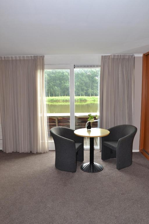 Posezení v ubytování Fletcher Hotel - Resort Spaarnwoude