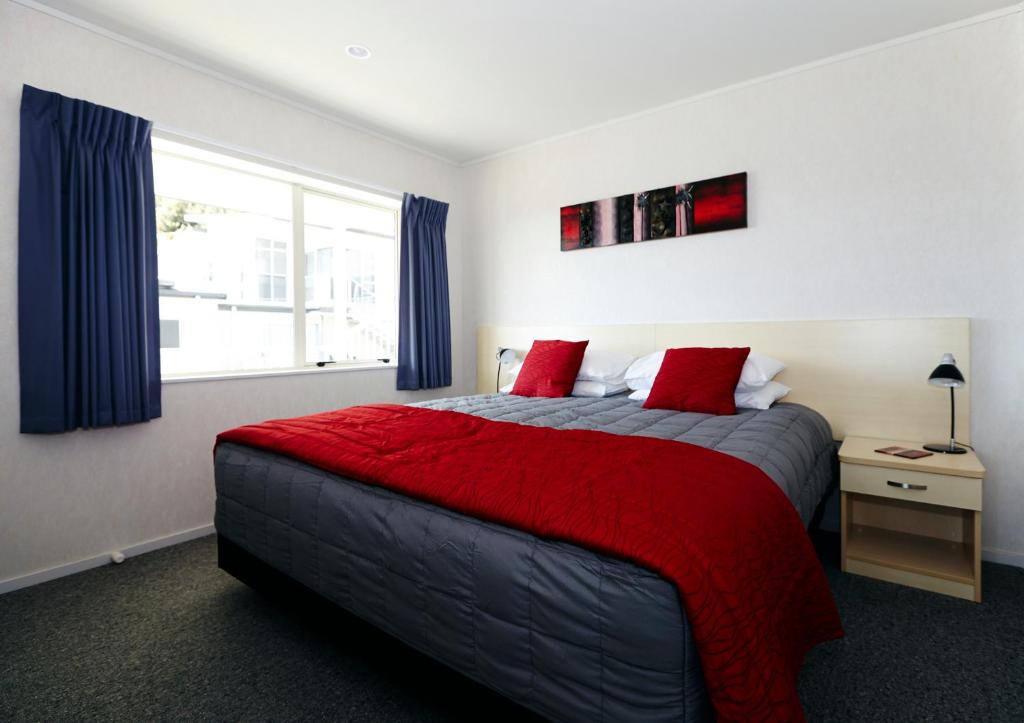 Postel nebo postele na pokoji v ubytování Paihia Apartments