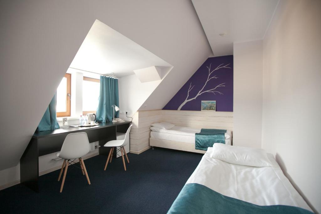 Кровать или кровати в номере Отель Никола