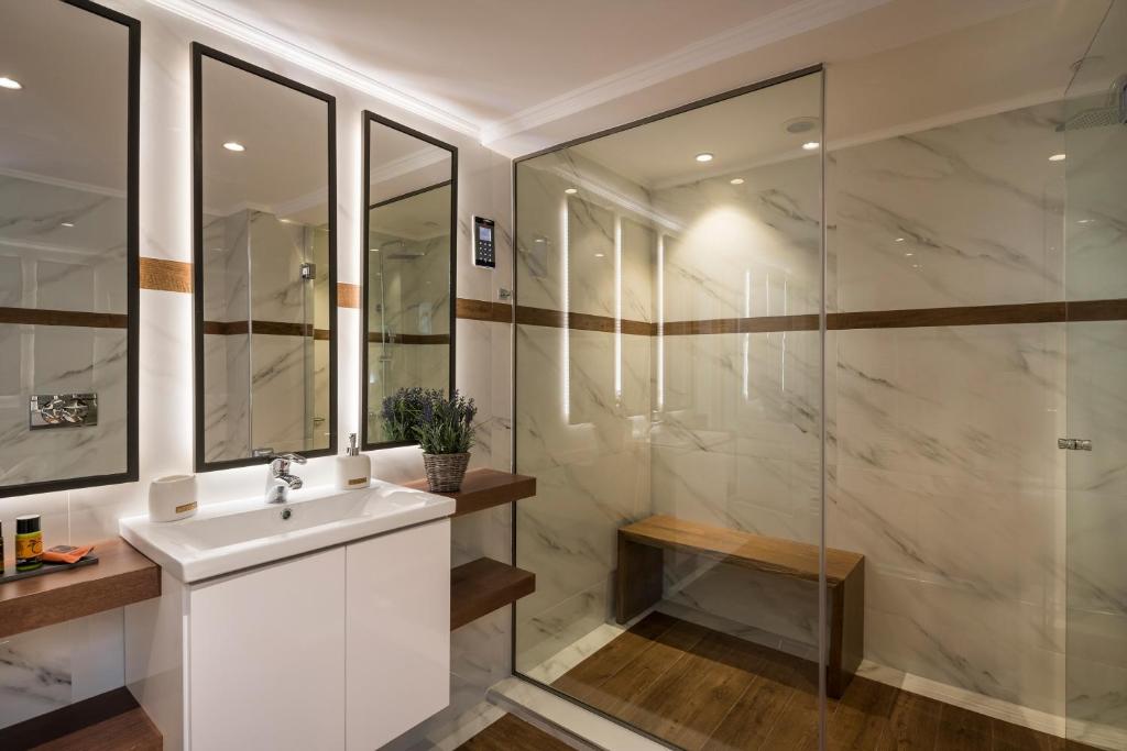 Kúpeľňa v ubytovaní Sun Ray Luxury Apartments