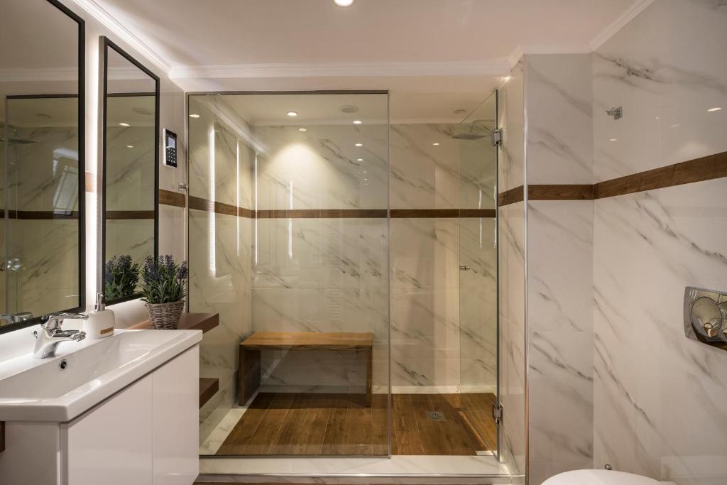 Kúpeľňa v ubytovaní Sun Ray Luxury Apartments
