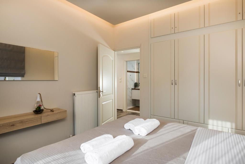 Posteľ alebo postele v izbe v ubytovaní Sun Ray Luxury Apartments