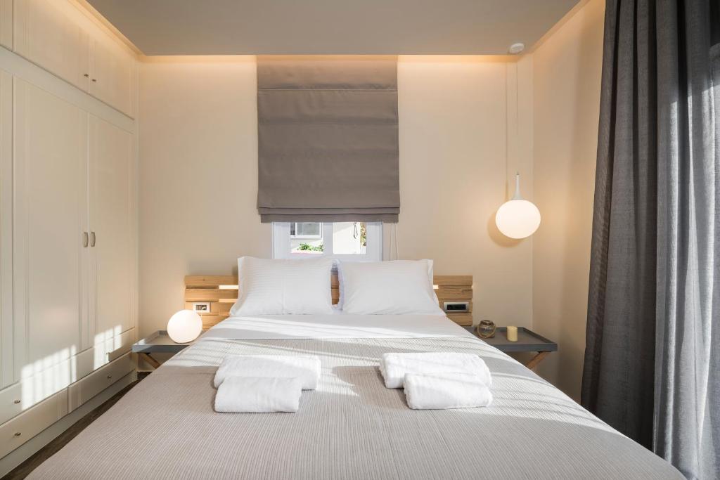 Posteľ alebo postele v izbe v ubytovaní Sun Ray Luxury Apartments