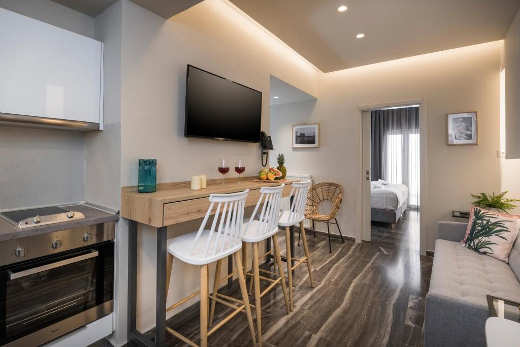 Televízia a/alebo spoločenská miestnosť v ubytovaní Sun Ray Luxury Apartments