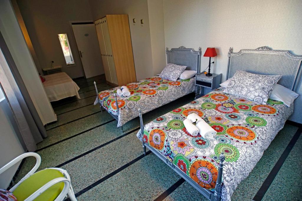 Postel nebo postele na pokoji v ubytování Casa Kilig