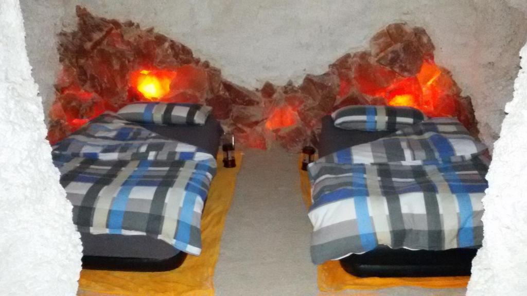 Postel nebo postele na pokoji v ubytování Wellness Pension Salzgrotte