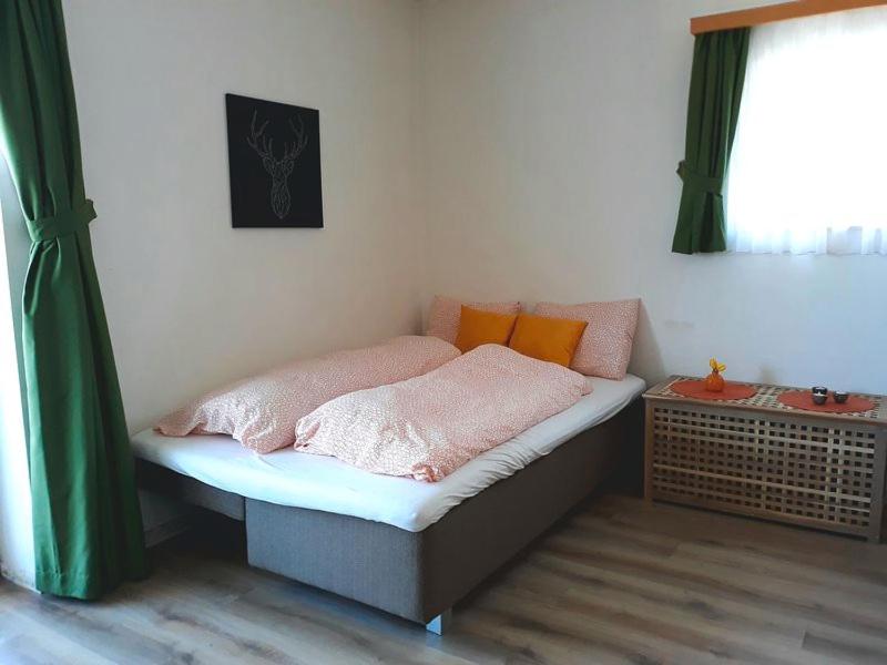 Ein Bett oder Betten in einem Zimmer der Unterkunft Appartement Gern