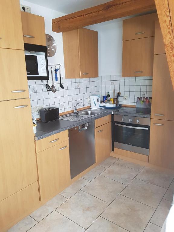 Kuchyň nebo kuchyňský kout v ubytování Ferienwohnung Hub