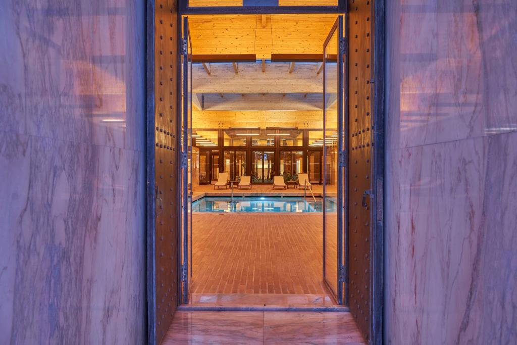 a view of a swimming pool through a doorway at Hotel Porto Santo & Spa in Porto Santo