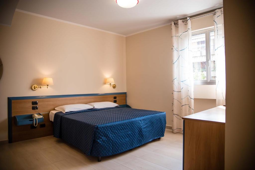 Postel nebo postele na pokoji v ubytování Hotel Citta' Di Conegliano