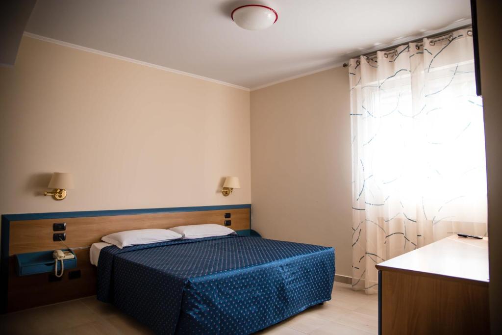 Postel nebo postele na pokoji v ubytování Hotel Citta' Di Conegliano