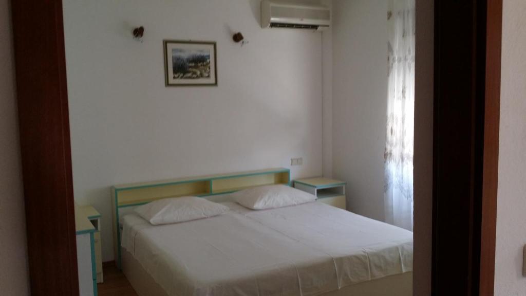 Posteľ alebo postele v izbe v ubytovaní Apartment Maca