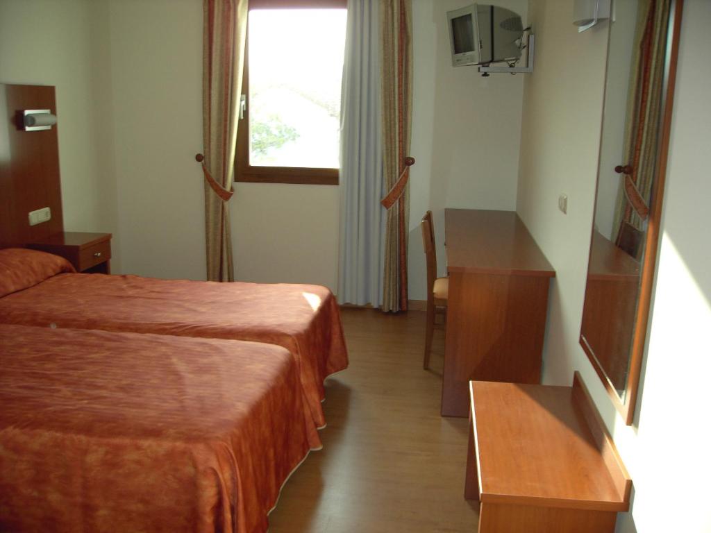 Postel nebo postele na pokoji v ubytování Hotel Agorreta
