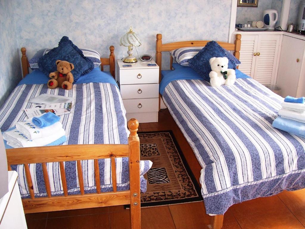 Postel nebo postele na pokoji v ubytování Sunnyside B&B