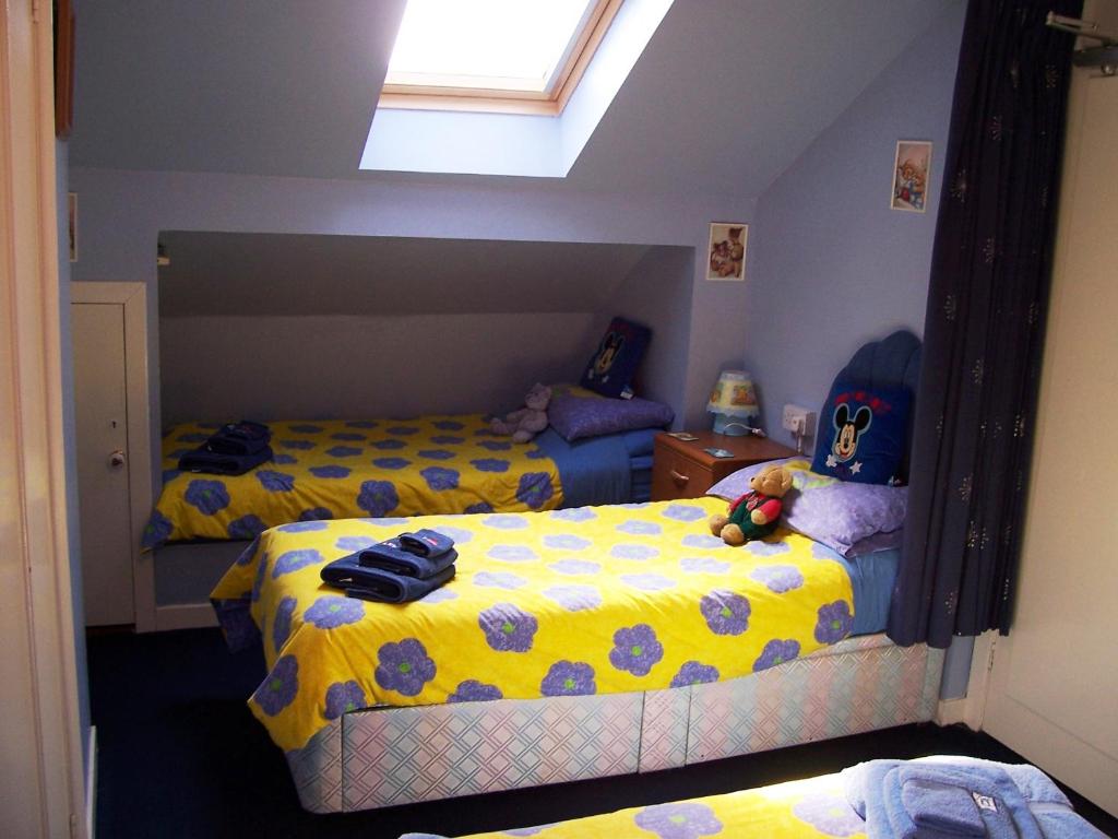 Postel nebo postele na pokoji v ubytování Sunnyside B&B