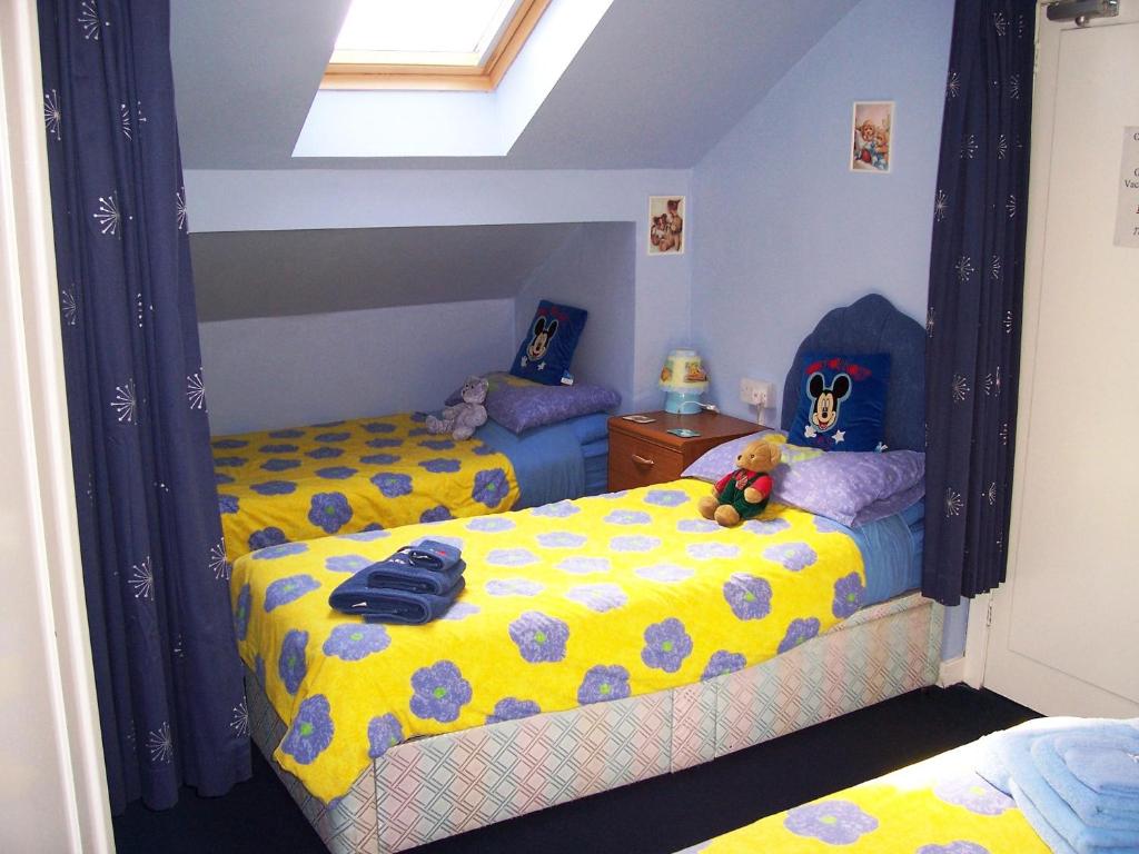 Postel nebo postele na pokoji v ubytování Sunnyside B&B