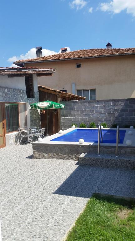 The swimming pool at or near Banya Guest Rooms 23