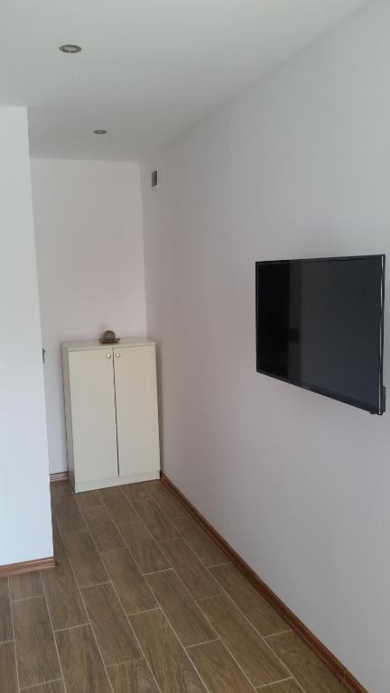 TV a/nebo společenská místnost v ubytování Banya Guest Rooms 23