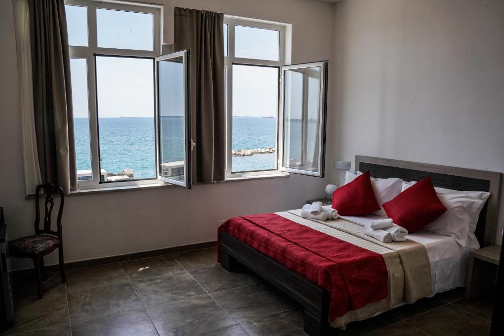 Postel nebo postele na pokoji v ubytování Hotel Virgilio