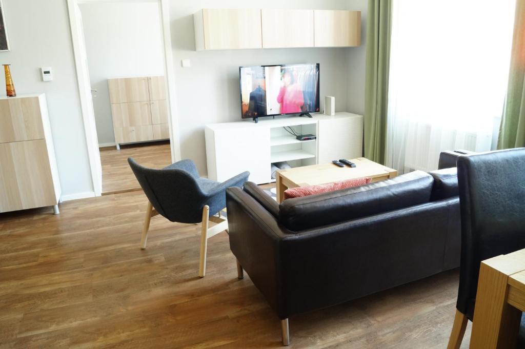 TV a/nebo společenská místnost v ubytování Apartmány Mary