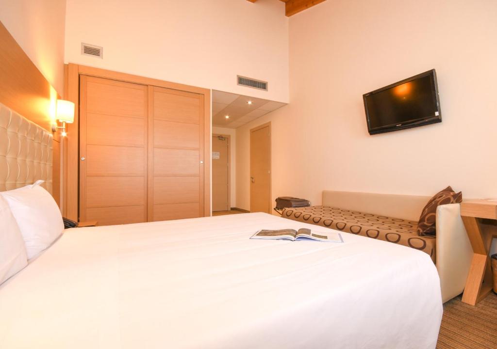 TV a/nebo společenská místnost v ubytování TH Lazise - Hotel Parchi Del Garda
