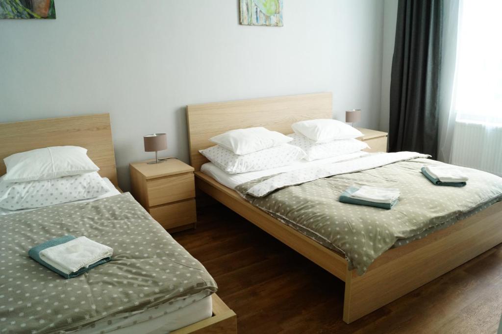 Postel nebo postele na pokoji v ubytování Apartmány Mary
