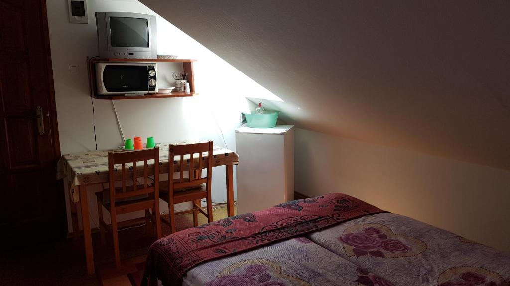 Postel nebo postele na pokoji v ubytování Mészöly Vendégház