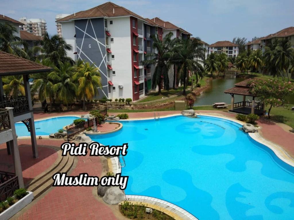 Изглед към басейн в PD Perdana - Pidi Resort A108 или наблизо