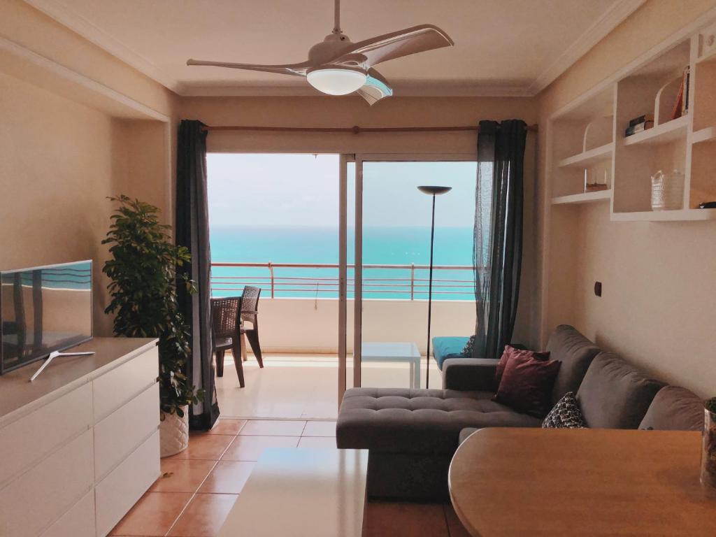 a living room with a view of the ocean at Fantásticas Vistas al Mar in Alicante