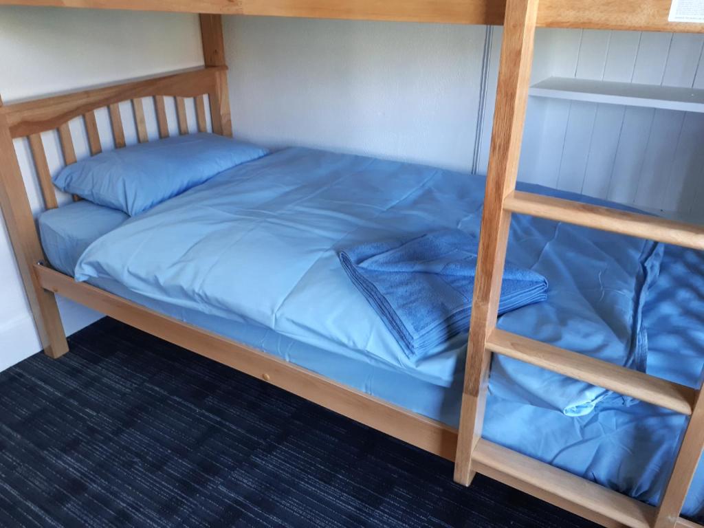 Postel nebo postele na pokoji v ubytování Torrin Bunkhouse