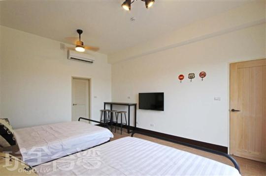 Postel nebo postele na pokoji v ubytování 茅店BnB