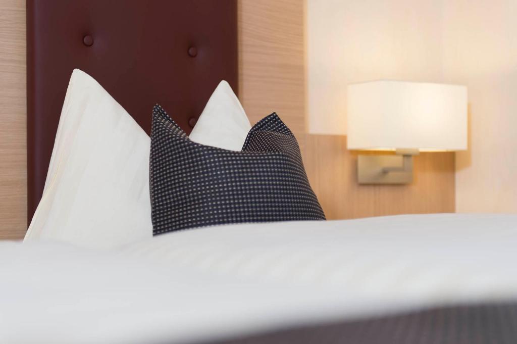 Postel nebo postele na pokoji v ubytování Bio-Hotel Melter