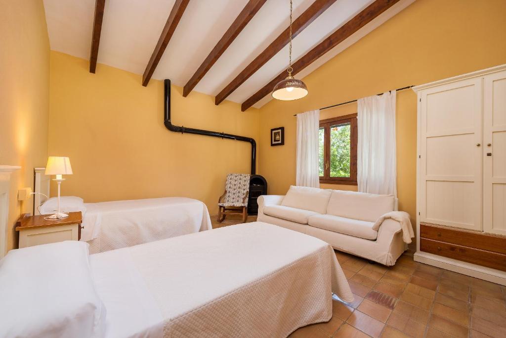 Postel nebo postele na pokoji v ubytování Villa SON FUM by Mallorca Villa Selection