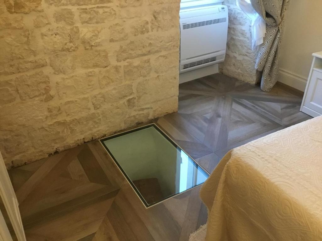 A bed or beds in a room at BED & BREAKFAST PL PALACE