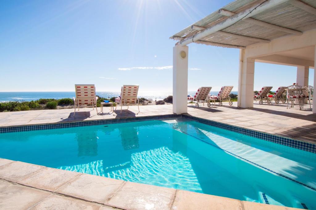 The swimming pool at or close to Oystercatcher Villa