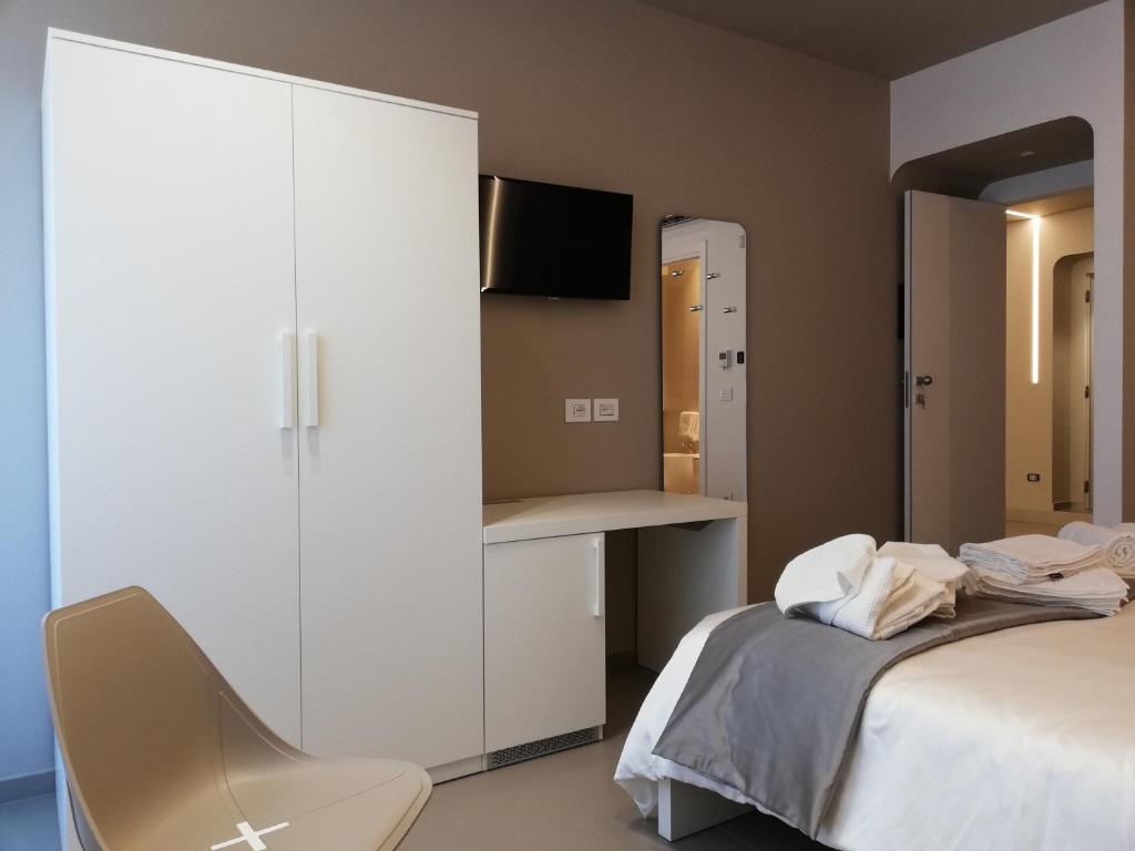Кровать или кровати в номере Maison Saint Honorè