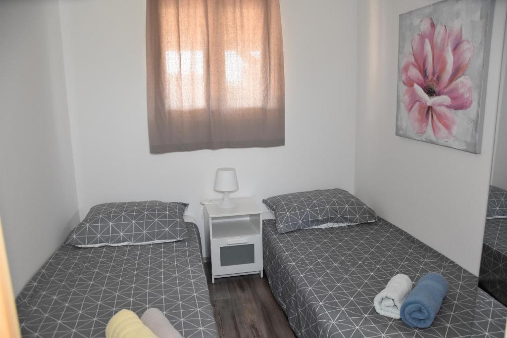Postel nebo postele na pokoji v ubytování Kamp Tonči