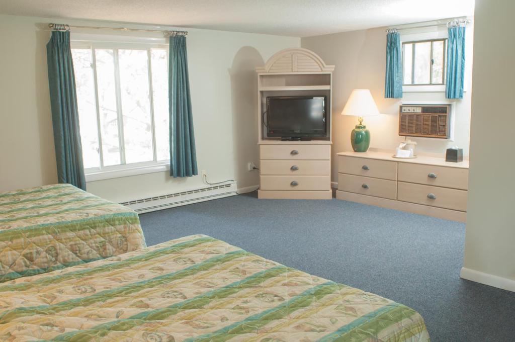 Postel nebo postele na pokoji v ubytování Southfleet Motor Inn