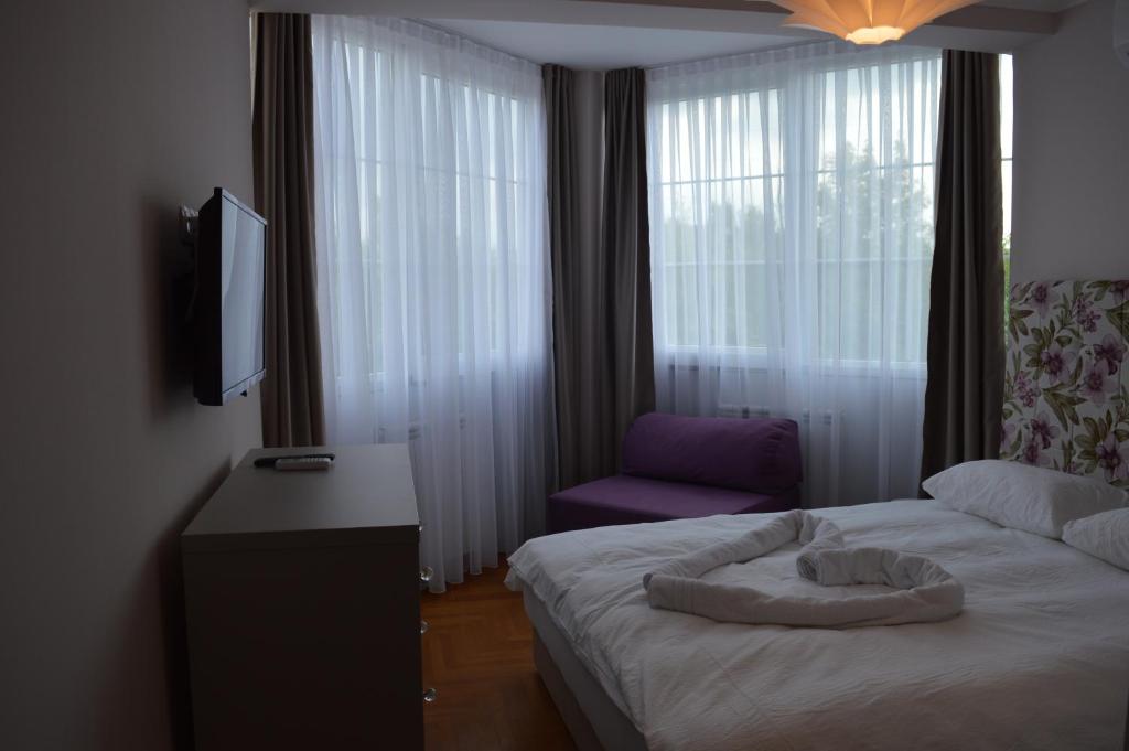 Postel nebo postele na pokoji v ubytování Hotel Drina Premium