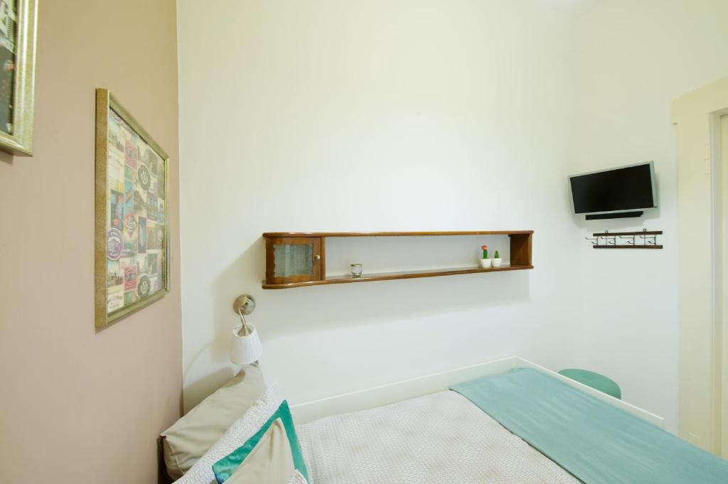 Posteľ alebo postele v izbe v ubytovaní Green Door Family Apartment