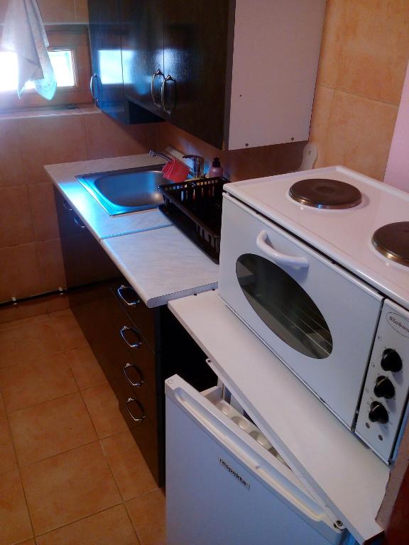 Kuchyň nebo kuchyňský kout v ubytování S' Centro - park apartments