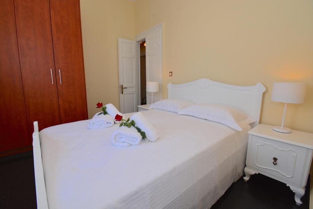 Posteľ alebo postele v izbe v ubytovaní Angiolina Sea View Apartment