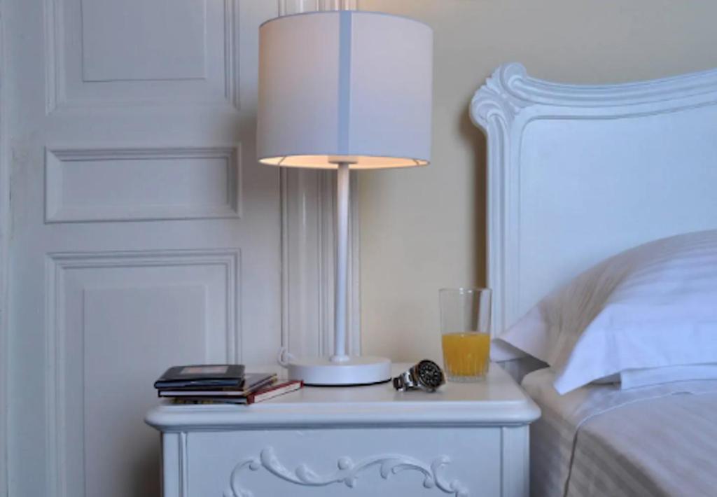 Posteľ alebo postele v izbe v ubytovaní Angiolina Sea View Apartment