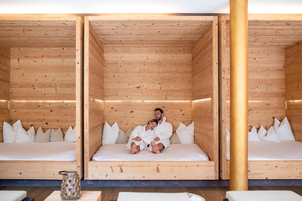 Postel nebo postele na pokoji v ubytování Hotel Pustertalerhof