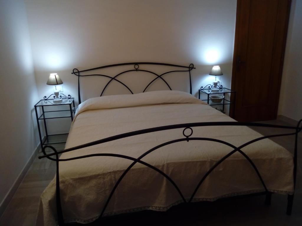 Postel nebo postele na pokoji v ubytování Le Strazzigne